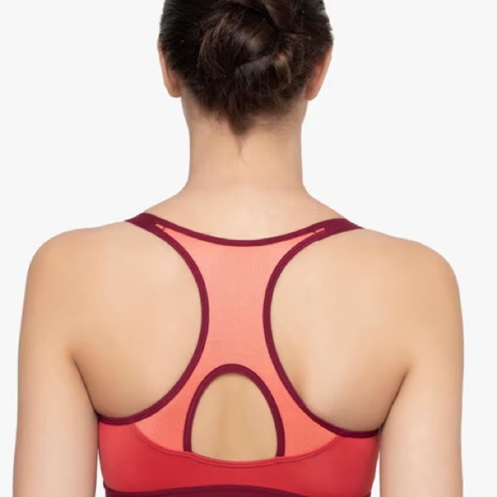 Lululemon Sweaty or Not Bra II in a pink and orange color combination